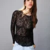 Camiseta de manga larga con volantes de encaje rubio