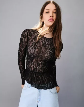 Camiseta de manga larga con volantes de encaje rubio
