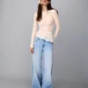 Camiseta de manga larga con volantes de encaje rubio