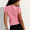 Camiseta fruncida con lazos laterales Camiseta fruncida con lazos laterales