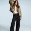 Chaqueta con capucha de pelo sintético Chaqueta con capucha de pelo sintético