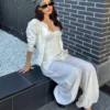 Chaqueta de cuello redondo a rayas con botones