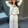 Chaqueta de cuello redondo a rayas con botones