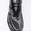 Detalle deportivo asimétrico – Zapatillas Detalle deportivo asimétrico – Zapatillas