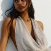 Minivestido halter con lentejuelas