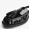 Mocasines sin talón con borlas