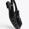 Mocasines sin talón con borlas