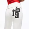 Pantalones acampanados de felpa con parche Pantalones acampanados de felpa con parche