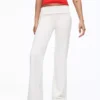 Pantalones acampanados de felpa con parche Pantalones acampanados de felpa con parche