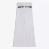 Pantalones acampanados de felpa con parche Pantalones acampanados de felpa con parche