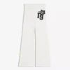Pantalones acampanados de felpa con parche Pantalones acampanados de felpa con parche
