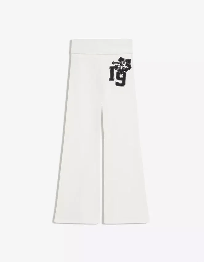 Pantalones acampanados de felpa con parche Pantalones acampanados de felpa con parche