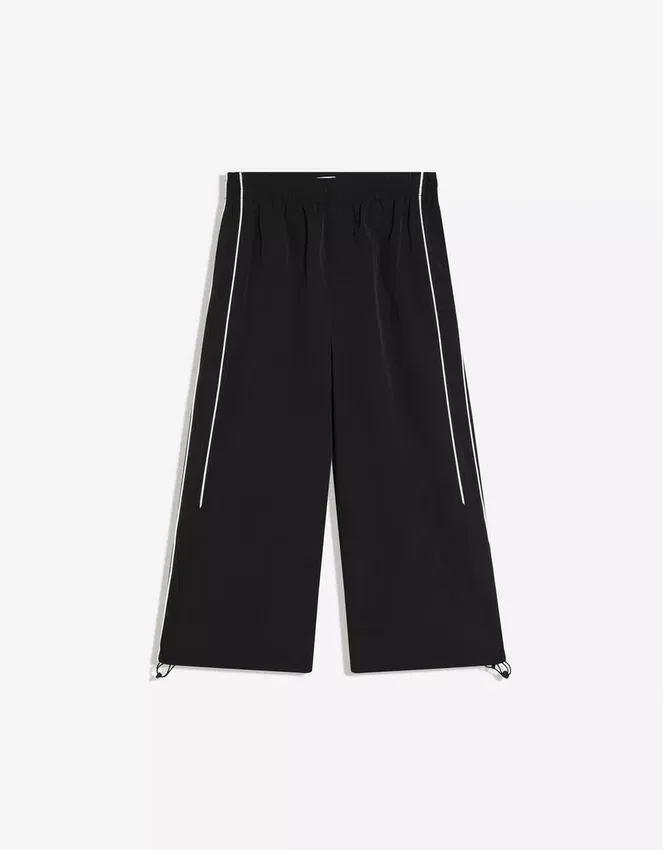 Pantalones capri técnicos con topes Pantalones capri técnicos con topes