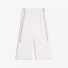 Pantalones capri técnicos con topes Pantalones capri técnicos con topes