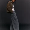 Pantalones de corte acampanado con topes – Pantalones