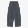 Pantalones de corte acampanado con topes – Pantalones