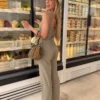 Pantalones de talle bajo con fajín Pantalones de talle bajo con fajín