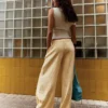 Pantalones fluidos a rayas – Mujer Pantalones fluidos a rayas – Mujer