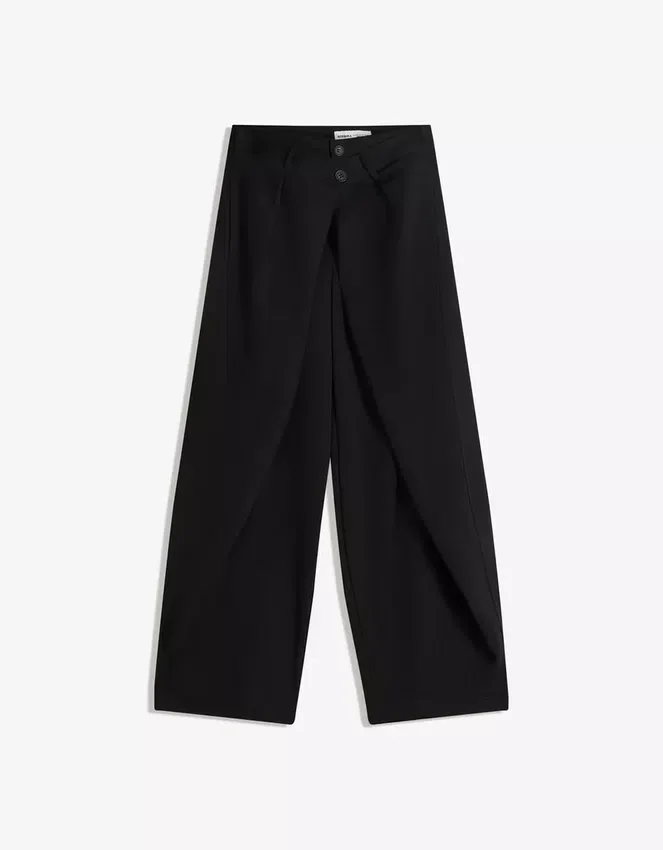 Pantalones plisados con doble botón Pantalones plisados con doble botón
