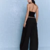 Pantalones plisados con doble botón – Pantalones