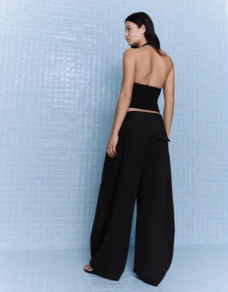 Pantalones plisados con doble botón – Pantalones