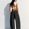 Pantalones plisados con doble botón – Pantalones – Mujer