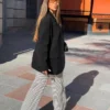 Pantalones rectos con estampado a rayas
