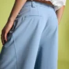 Pantalones voluminosos de doble tejido