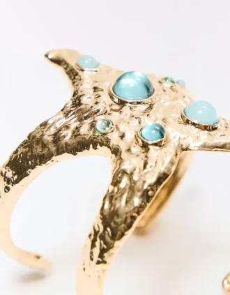 Pulsera tipo esclava con estrella de mar