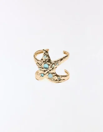 Pulsera tipo esclava con estrella de mar