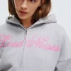 Sudadera con capucha Oversize estampada y cremallera Sudadera con capucha Oversize estampada y cremallera