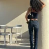Vaqueros bootcut de talle bajo con solapas – Pantalones