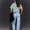 Vaqueros de cintura alta, corte Straight y pierna Wide Leg con bajos remangados – Pantalones Vaqueros de cintura alta, corte Straight y pierna Wide Leg con bajos remangados – Pantalones