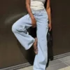 Vaqueros de cintura alta y pierna Wide Leg con cintura cruzada Vaqueros de cintura alta y pierna Wide Leg con cintura cruzada