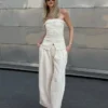 Vaqueros de corte ancho y talle bajo con pinzas Vaqueros de corte ancho y talle bajo con pinzas