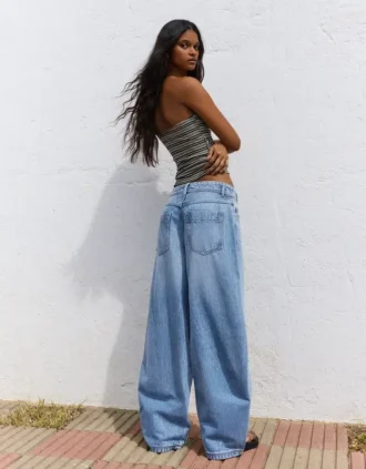 Vaqueros de talle bajo y pierna Wide Leg con botones delanteros – Pantalones