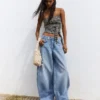 Vaqueros de talle bajo y pierna Wide Leg con botones delanteros – Pantalones