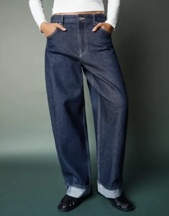 Vaqueros holgados de talle bajo con bajo remangado – Pantalones