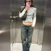 Vaqueros rasgados de talle bajo y corte Straight Vaqueros rasgados de talle bajo y corte Straight